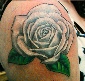realistic white rose tattoo